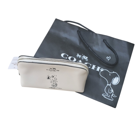 Coach Handbags - NWT COACH x SNOOPY cosmetic bag F65208